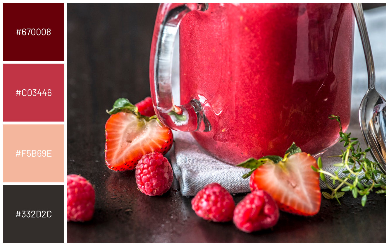 strawberry raspberry drink in jar on wodden table