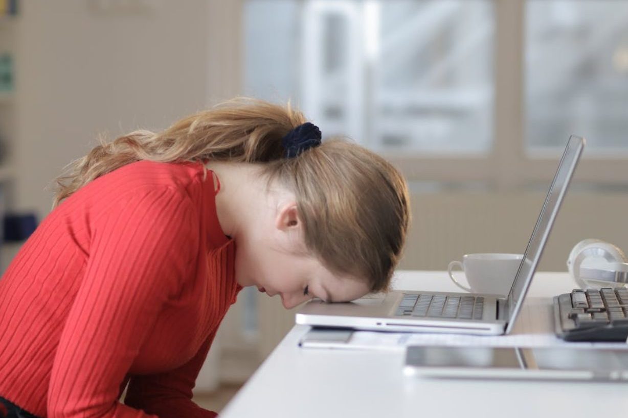 woman sitting at desk frustrated with website edited Bryckroad Creative